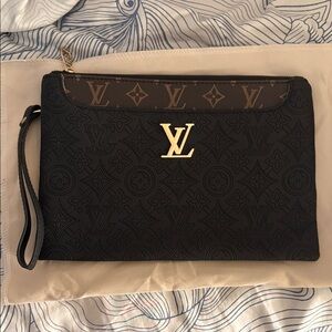 LV clutch/wristlet